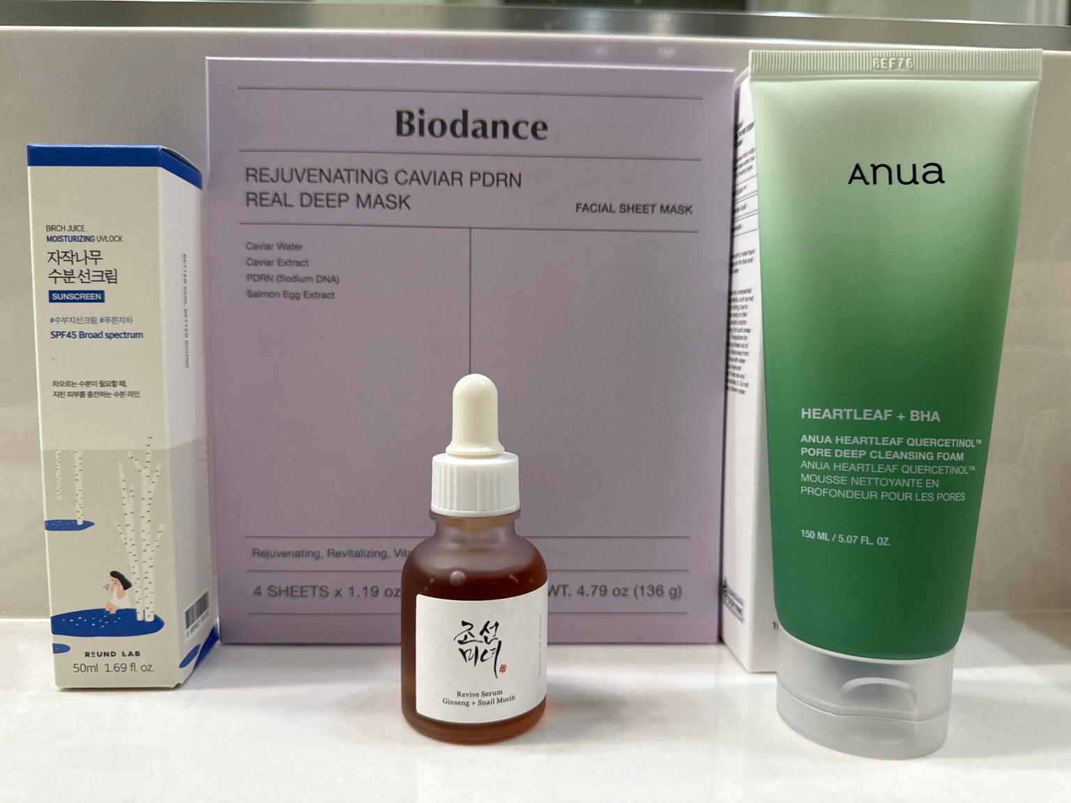Glassglow Glass Skin Essentials Bundle with Biodance mask, Anua cleanser, Beauty of Joseon serum, and Round Lab sunscreen